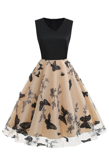 Svart V-ringning Vintage 50 tals klänning med applikationer